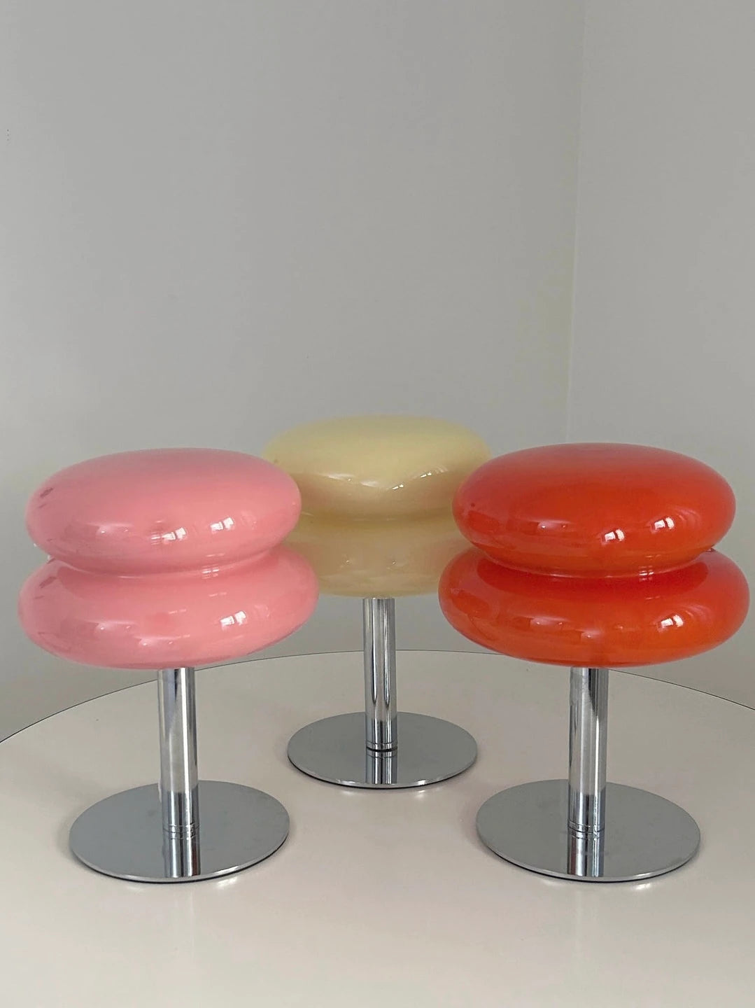 Tres Lumi Cloud juntas: rosa, beige y naranja